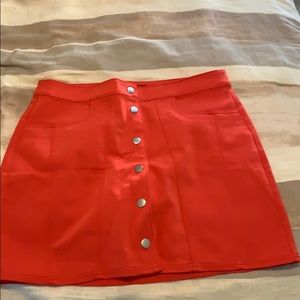 Coral/pink button front mini skirt